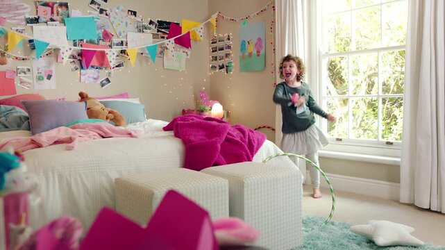 Dancing, crazy and child in bedroom with rhythm, freedom or talent with music on weekend. Groove, creative and girl kid moving to playlist with energy for growth, fun and development in house.