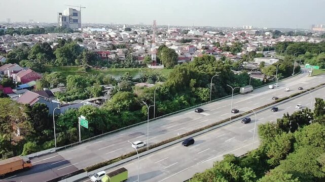 Aerial Drone View of Urban Highway and Residential District in Daylight