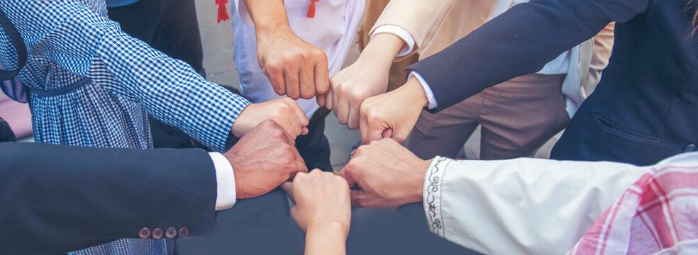 Diversity Teamwork hands stack together trust partner. Businesspeople handshake Leader Trust team handshake promise. MultiEthnics Teamwork high five hands stack shake hands together. Business partner