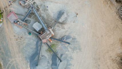 Aerial View of Rock Crusher Machinery in Industrial Quarry, Mining Site from Above © katakaneh