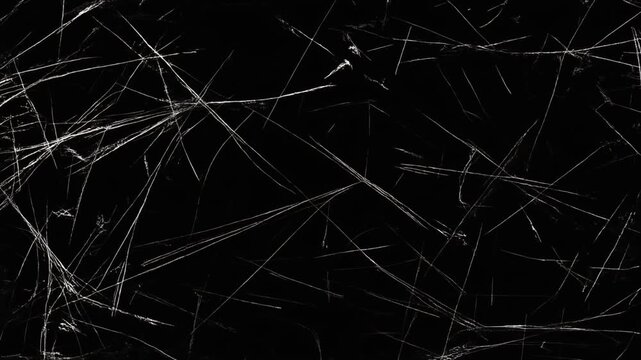Abstract black background with white scratches and lines texture animation seamless loop