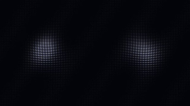 Halftone dot grid with shifting light on black background