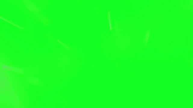 Washed out faded rain streaks drifting diagonally on chroma key green screen background, vintage style soft storm shower overlay for retro historical cinema flashback scenes keying.