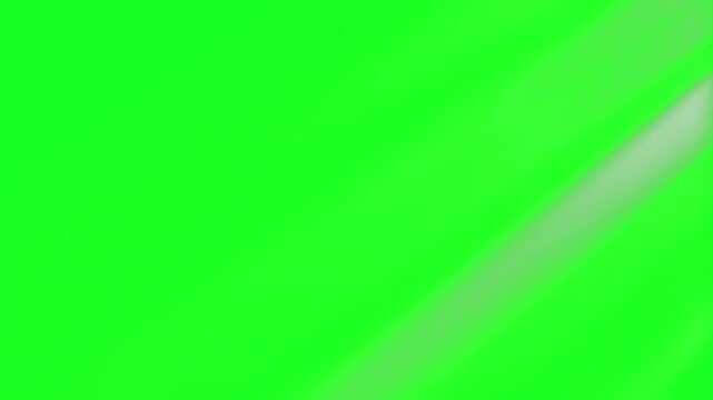 Bottom right soft illumination and corner glow project across a green screen chroma key background. This high-quality visual effect asset is designed for premium cinematic video