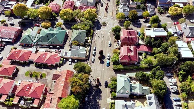 Local residential street in Launceston city houses and squares aerial vertical view up to sky.