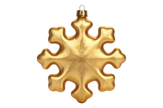 Golden metallic snowflake holiday decoration isolated on black