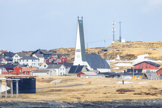 Part of Vard&oslash; seen from the coastal route on a beautiful spring day - Vardo Church