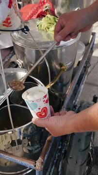 Street Vendor Preparing Traditional Filipino Taho Snack
