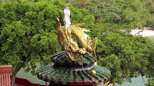Statue of Guanyin godess or Kwan Yin is the revered East Asian Bodhisattva of mercy, compassion, and unconditional love at Pangkor island in Malaysia