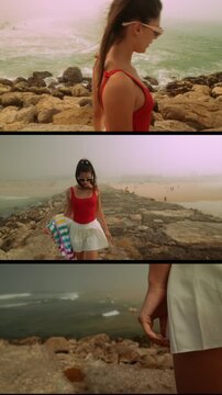 Cinematic shot capturing woman in swimsuit with waves and reflective mood