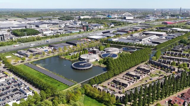 Aerial view of wastewater treatment plant and solar panels