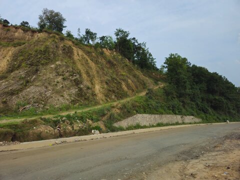Mountain Highway Journey to Kathmandu Nepal Through Himalayan Landscape, Rural Transportation Route, Vehicles on Scenic Road, Travel and Infrastructure Development