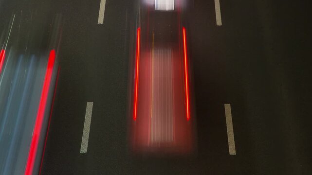 Timelapse of cars moving on the road in the evening, fast moving cars