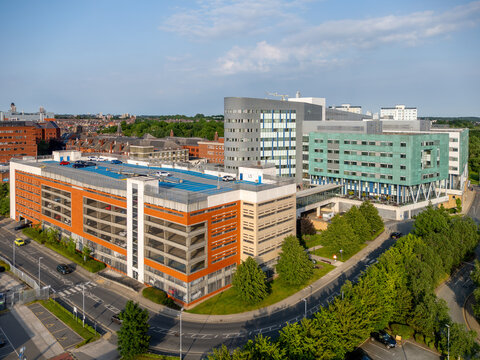 Leeds General Infirmary in Leeds, West Yorkshire, England, aerial view of the major NHS hospital, medical buildings and surrounding Leeds city centre skyline.