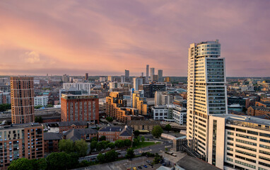 Leeds, Yorkshire, England at sunset, aerial view from Bridgewater Place looking north across the modern Leeds skyline and illuminated commercial district.
