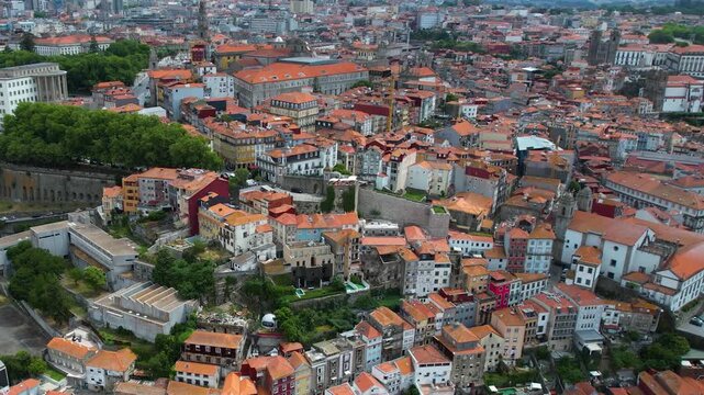Aerial view beside the old town around the city Porto in Portugal beside the Douro River on  a sunny summer day.