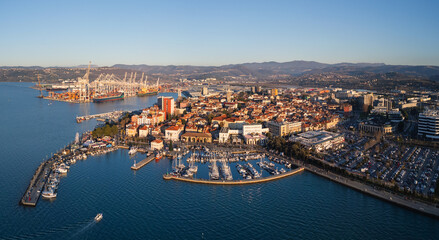 Obraz premium Aerial view of Koper, Slovenia showing the marina, waterfront, and urban landscape by the Adriatic Sea in a popular travel destination.