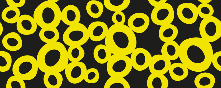 Seamless abstract pattern bright yellow hand drawn chaotic overlapping circles and rings of various sizes