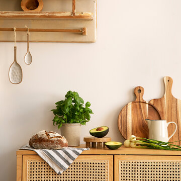 Fresh Baked Bread, Avocado, Herbs, and Kitchen Decor on a Cabinet in a Cozy Home Environment
