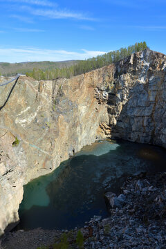 Tuimsky Gap, Khakassia, Russia. Collapse crater above mined-out space of closed underground mine
