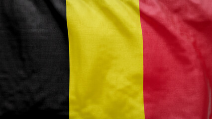 Fototapeta premium Belgian flag waving softly in the breeze. Perfect for football or sports event graphic assets and educational materials.
