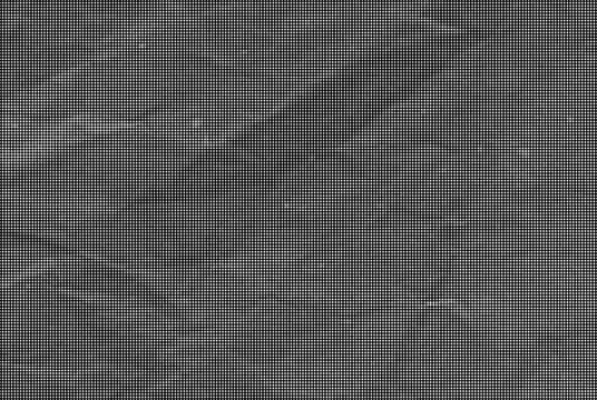 A close-up view of a crumpled dark gray textured surface with wrinkles and creases.
