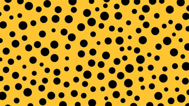 yellow background with black polka dots