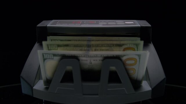 Cash Counter Sorting Hundred Dollar Bills