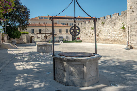Historic stone wells at Five Wells Square in Zadar Croatia, representing ancient water sources and preservation