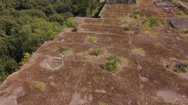 Low aerial over the weathered roof of Bunker Valentin in Bremen