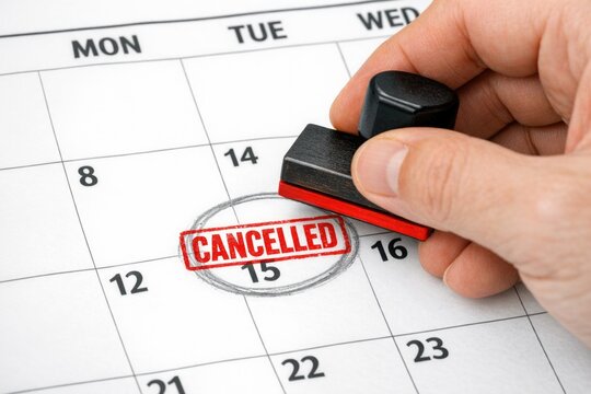 A stamp with the word 'cancelled' marked on a calendar page