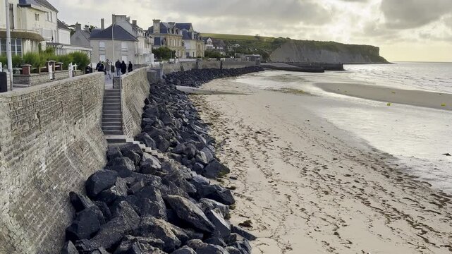 Beauty shot shows charming French coastal town of Arromanches-