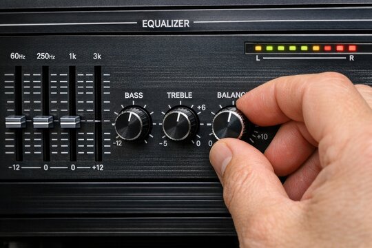 Person adjusting radio knobs
