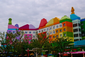Naklejka premium Shanghai,China-May 30th 2026: Exterior of the Legoland Hotel in Shanghai, building design inspired by colorful Lego bricks