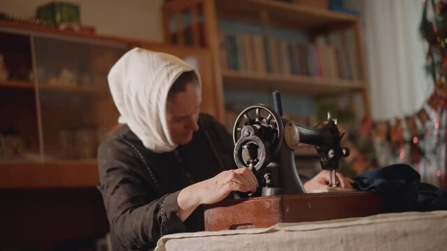 Elderly woman sewing on vintage machine, soft warm light, wooden bookshelf background, white headscarf, careful handguided stitches, cozy domestic atmosphere, delicate fabric repair