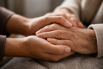 Fototapeta premium Supportive Hands Resting on a Table in a Compassionate Gesture for Connection and Care