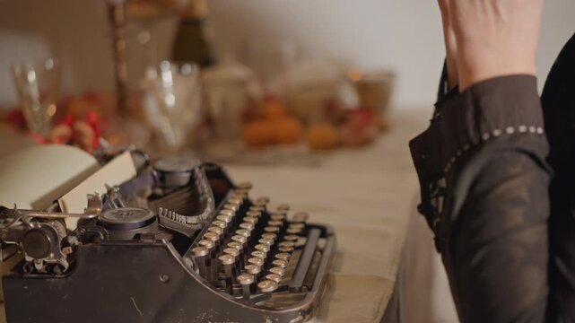 Writer removes glasses and types on typewriter, closeup capturing contemplative gesture, ambient evening lights and scattered pages, fingers brushing keys as reflective narrative unfolds.