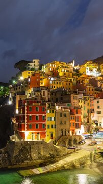 Vertical Time Lapse of the beautiful and scenic seaside village of Riomaggiore in Italy. One of the small towns that makes up Cinque Terre.