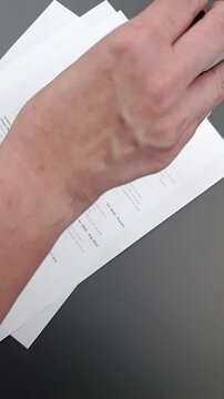 AI Approved stamp on Fake mock CV (curriculum vitae) resume, concept of job application approved by artificial intelligence and automated ATS screening.
