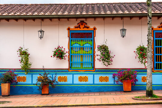 Colombia,Guatap&eacute;, typical colofrful house facade. 