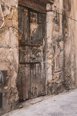 Fototapeta premium Weathered wood and crumbling stone.