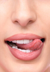 Obraz premium Detailed view of a person's mouth showing teeth and tongue