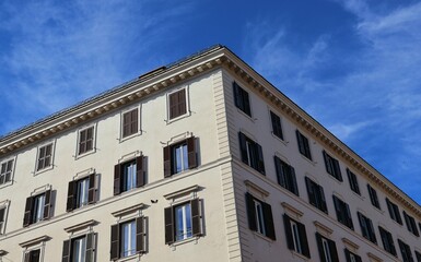 Fototapeta premium Elegant European Corner Building Under Blue Sky