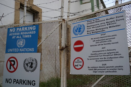 Close up of a warning sign at the demilitarized United States buffer zone at the Greek and Turkish border in Nicosia, Cyprus
