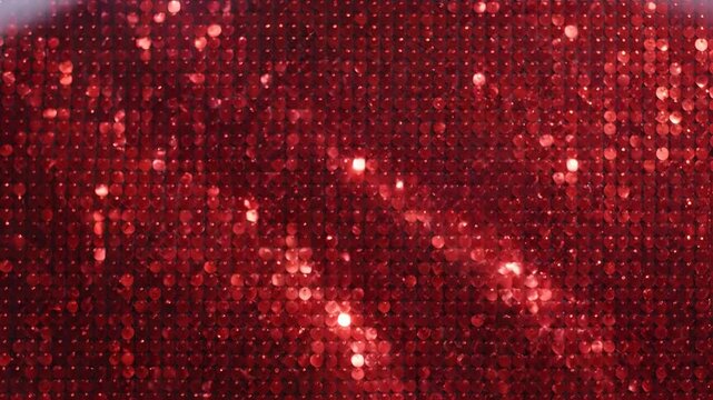 Sparkling Red Sequin Backdrop with Dramatic Light Beams.