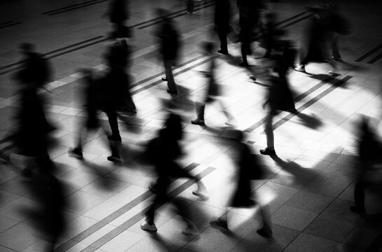 silhouettes of people walking