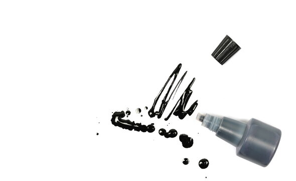 Black ink splashes with inkwell, droplets isolated on white, top view