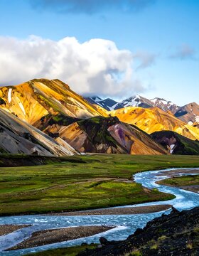 Golden sunset over rolling hills and river.