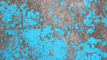 Fototapeta premium Peeling bright blue paint on rough concrete wall texture for grunge industrial backdrop and vintage graphic design