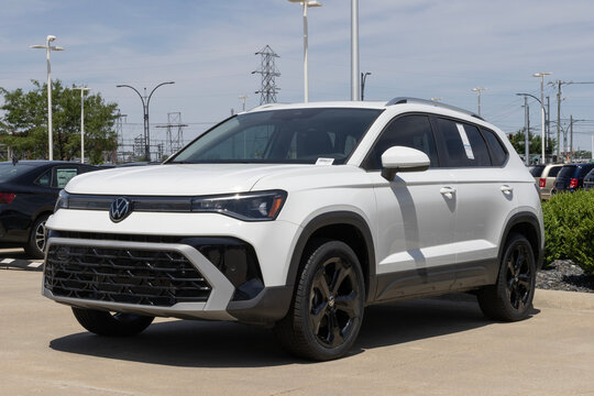 Used Volkswagen Taos at a dealership. With pricing concerns, VW is buying and selling preowned cars to meet demand. MY:2026